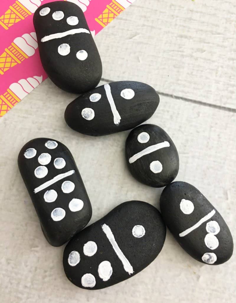 Smooth rocks aren't just for skipping them across the water anymore! You can make Rock Dominoes! With 28 smooth oval shaped rocks, you and your kids can make this fun craft idea that you can enjoy for hours at a time. 